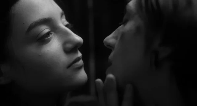 Two People Exchanging Saliva